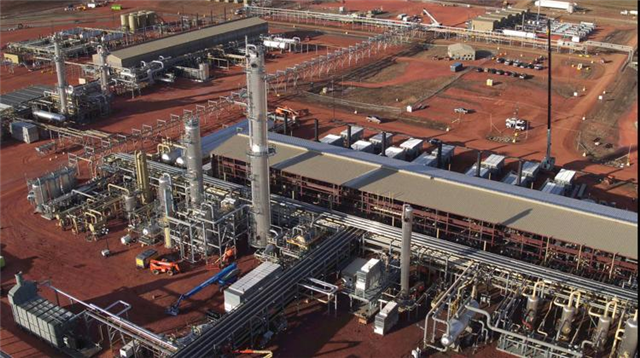 Aerial view of an industrial processing plant withSell Mineral Rights in Faulkner County