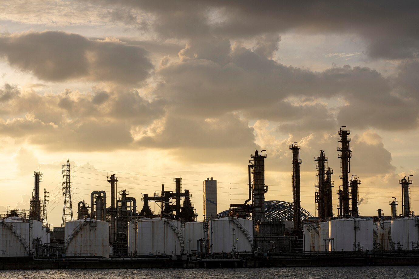 Industrial site emitting pollution, showcasing environmental concerns