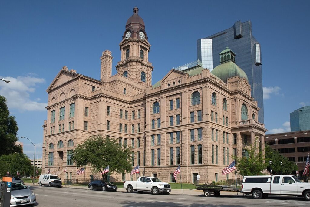 Tarrant County Courthouse, a large stone courthouse with a domed roof.